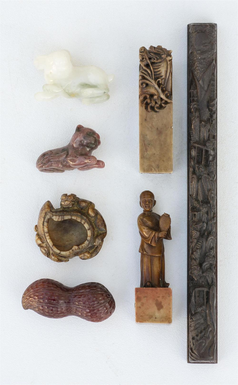 Appraisal: SEVEN CHINESE STONE ODDMENTS A scroll weight a soapstone seal