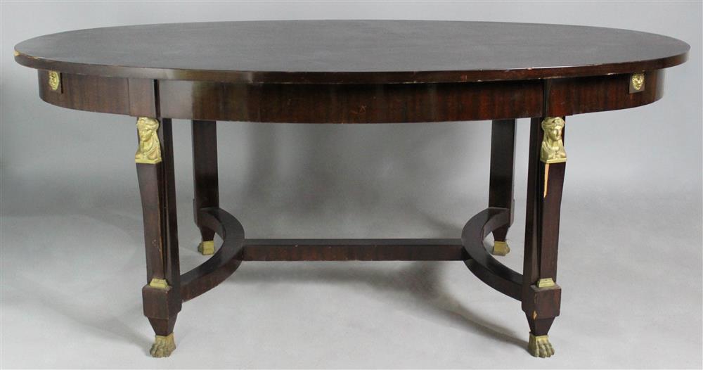 Appraisal: FRENCH EMPIRE OVAL DINING TABLE WITH ORMOLU MOUNTS having an