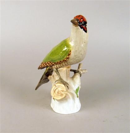 Appraisal: Dresden porcelain figure of a green woodpecker th century Modeled