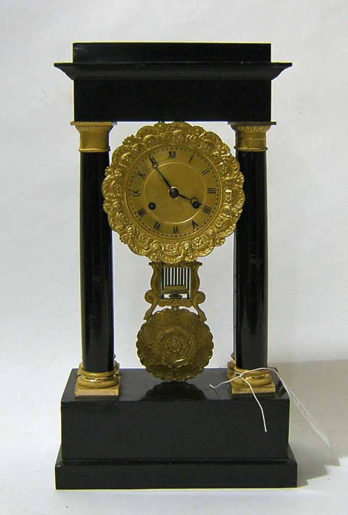 Appraisal: French ebonized and ormolu mounted portico clock late th c