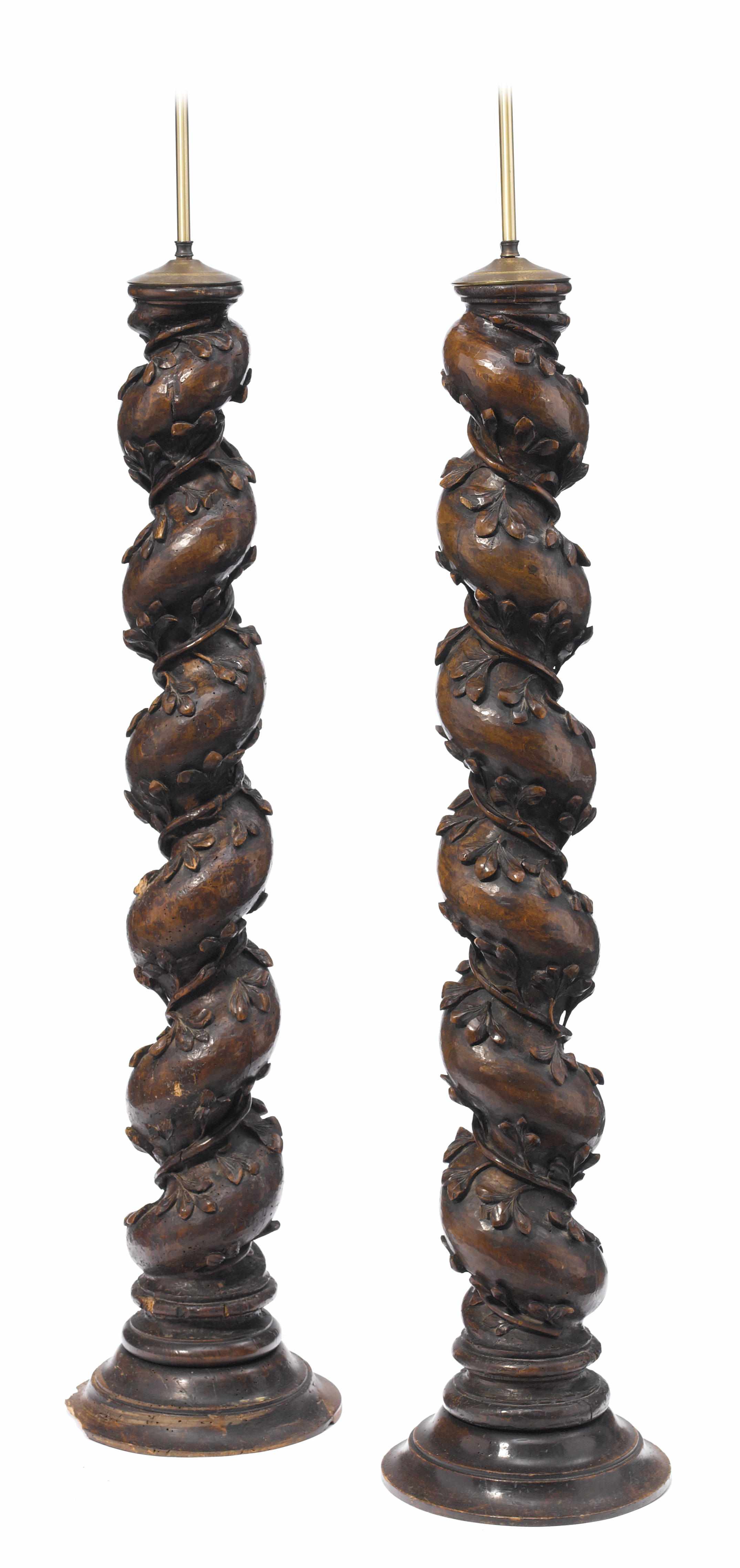 Appraisal: A pair of Continental Baroque style carved walnut columns now