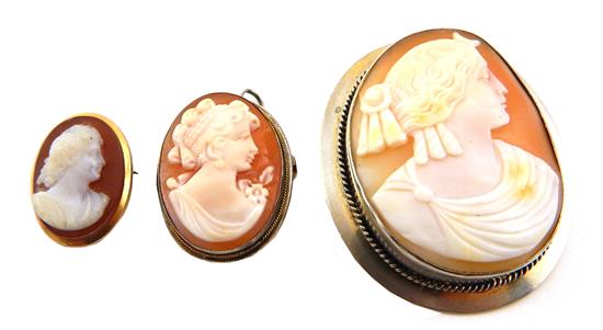 Appraisal: JEWELRY three carved shell and hardstone cameo brooches two Italian