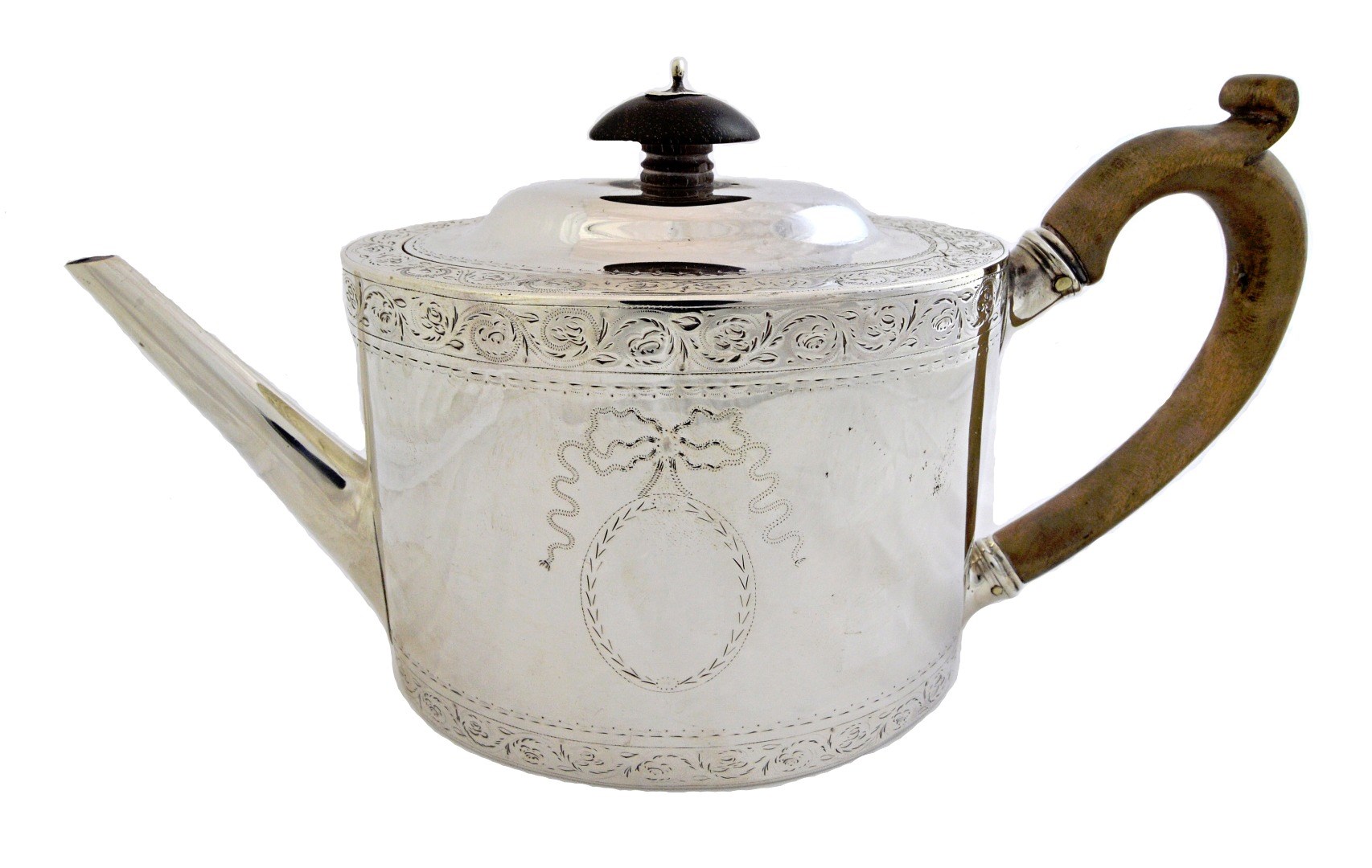 Appraisal: A George III silver teapot of oval form with a