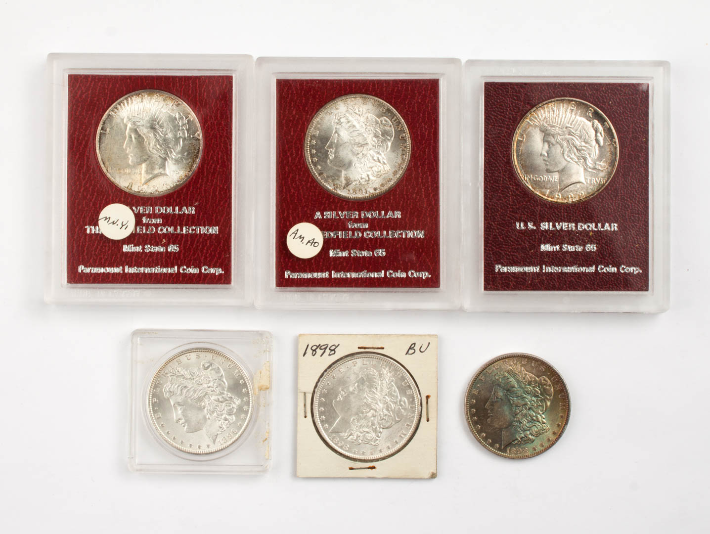 Appraisal: Six U S Morgan type silver dollars -' comprising -S