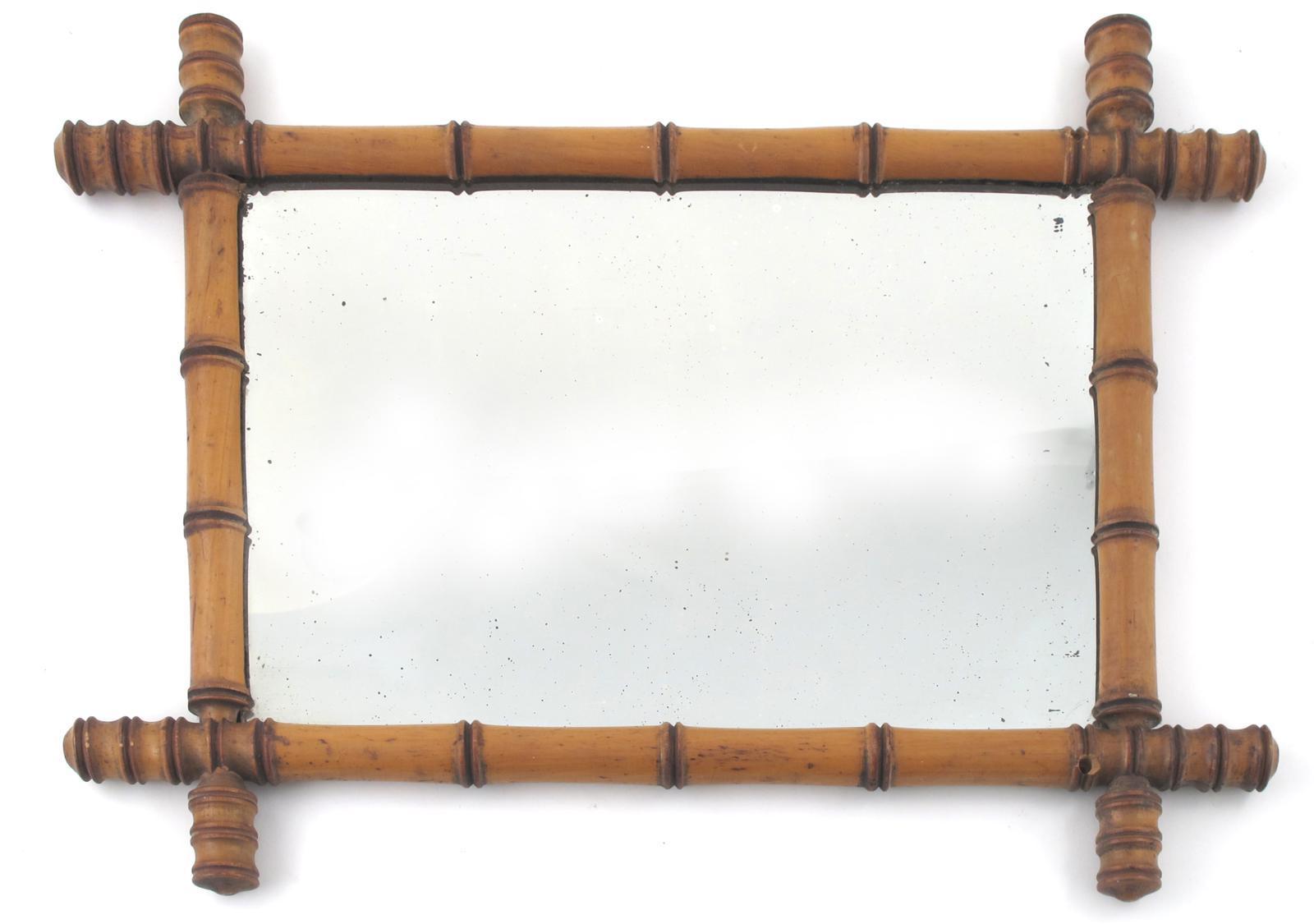 Appraisal: An Aesthetic Movement bamboo wall mirror