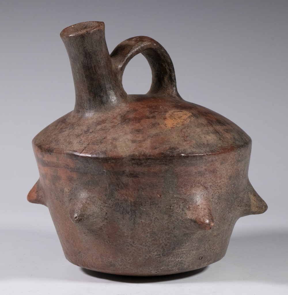 Appraisal: PERU MACANA SPOUTED VESSEL Spouted vessel circa BC simulating a