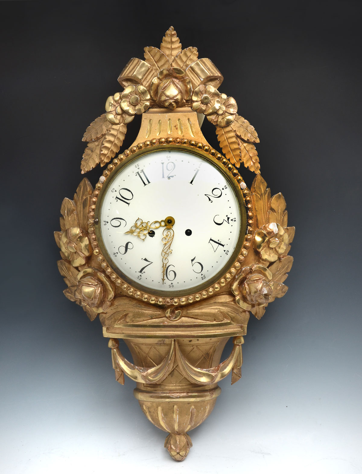 Appraisal: GILT WOOD CARTEL CLOCK Carved Gilt Cartel clock having white