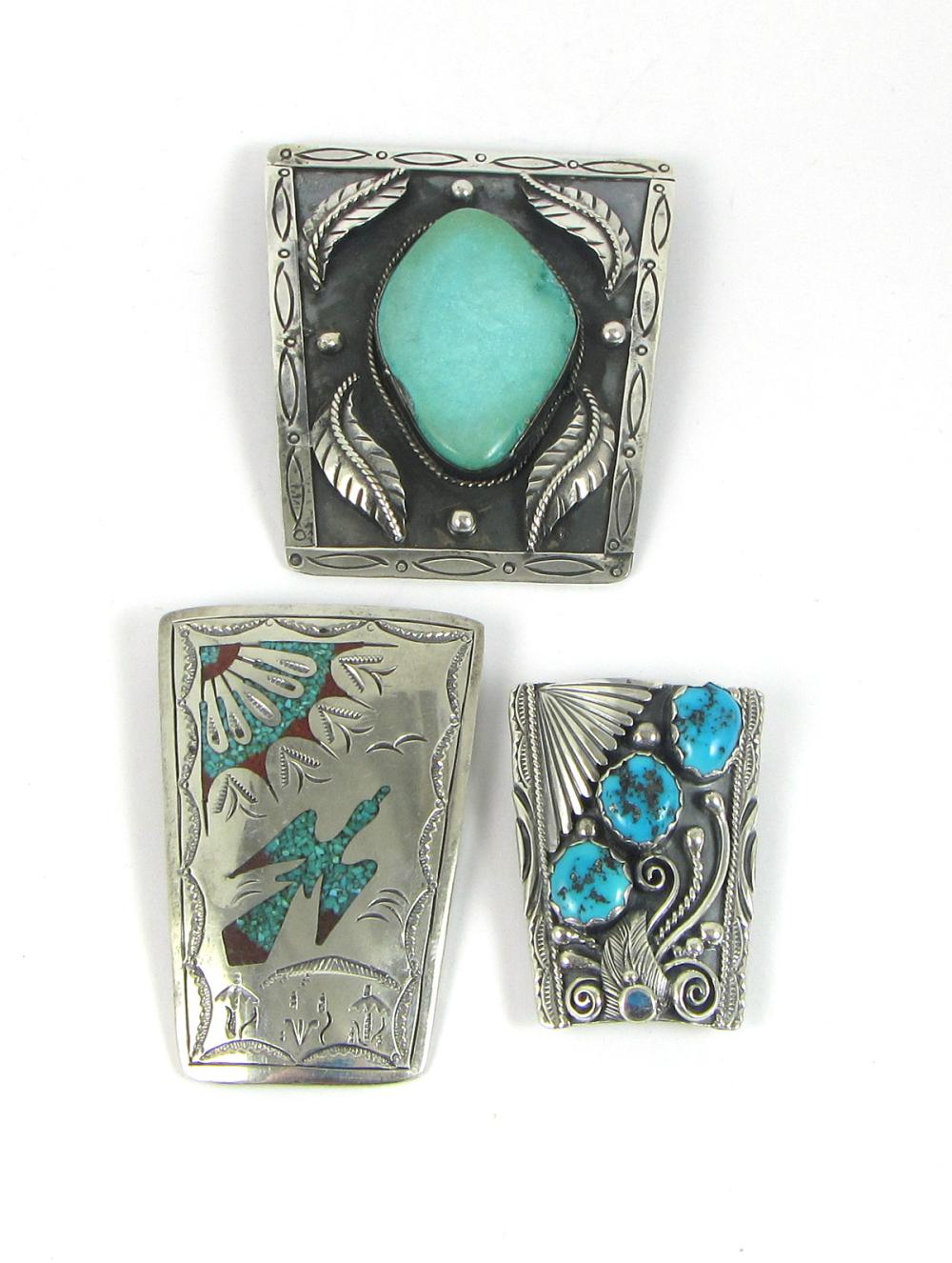 Appraisal: THREE NAVAJO TURQUOISE AND STERLING SILVER BOLOS including a sterling