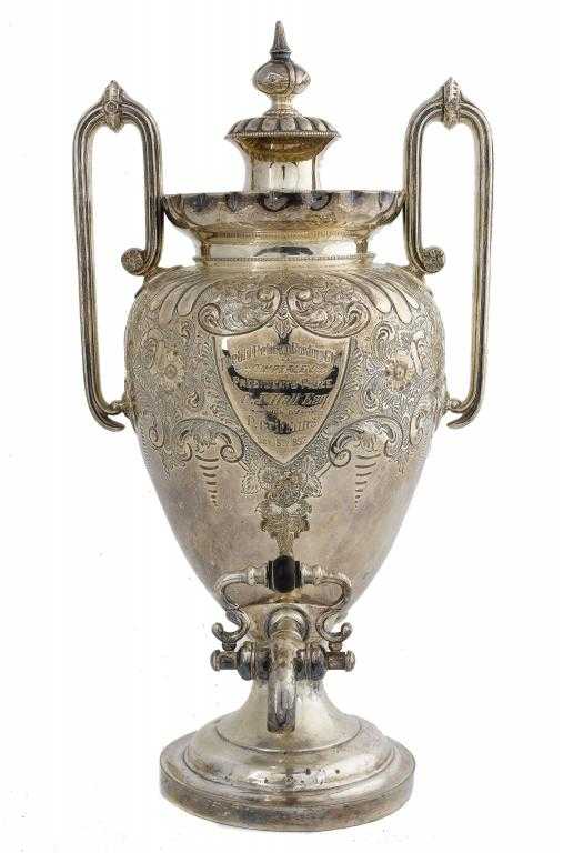 Appraisal: A VICTORIAN BRITANNIA METAL TEA URN AND COVER of two