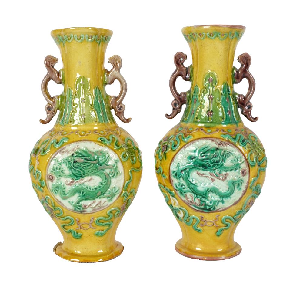 Appraisal: PAIR OF CHINESE CERAMIC VASESimpressed six-character mark decorated with dragons