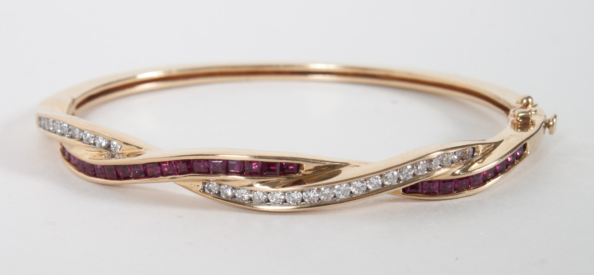 Appraisal: Lady's K gold diamond ruby bangle bracelet grams