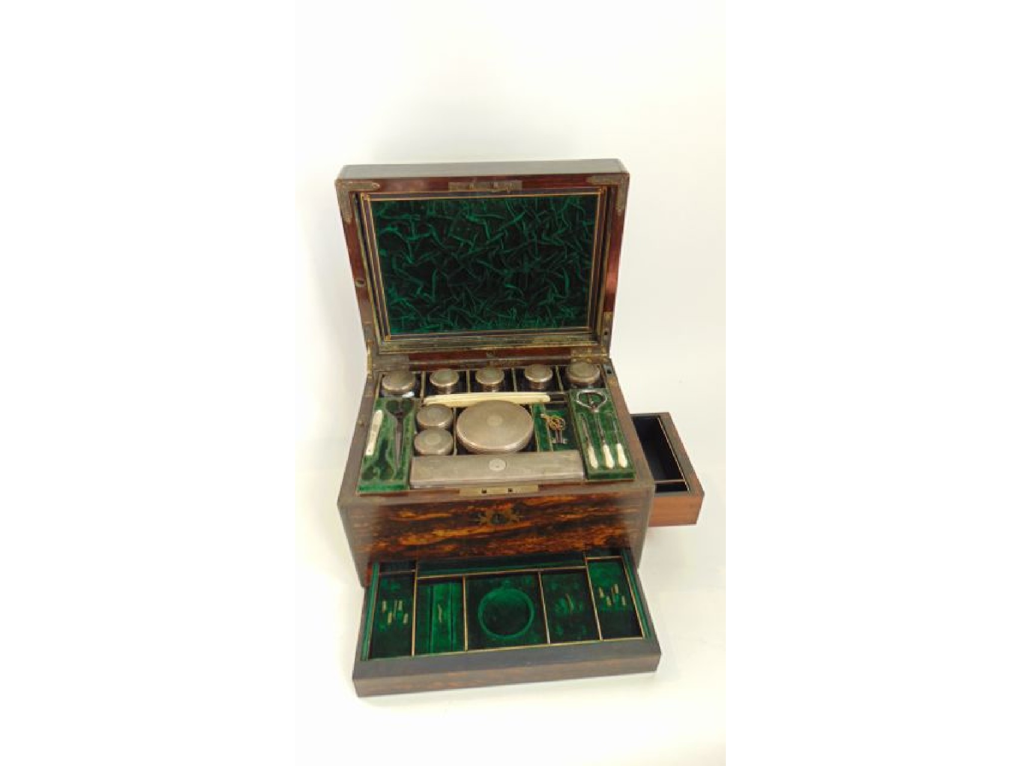 Appraisal: An assembled Victorian silver-mounted travelling toilet set James Vickery Thomas