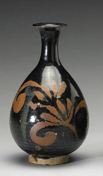 Appraisal: A Cizhou type black glazed bottle Jin Yuan Dynasty Of