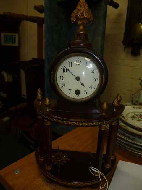 Appraisal: AN EARLY TH CENTURY CONTINENTAL MAHOGANY CASED DRUM HEAD TIMEPIECE