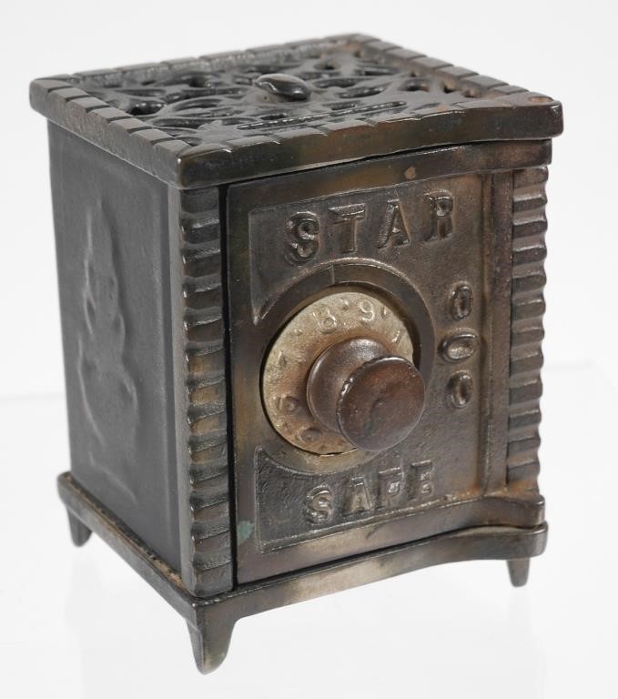 Appraisal: Star Safe cast iron coin still bank Bank measures x