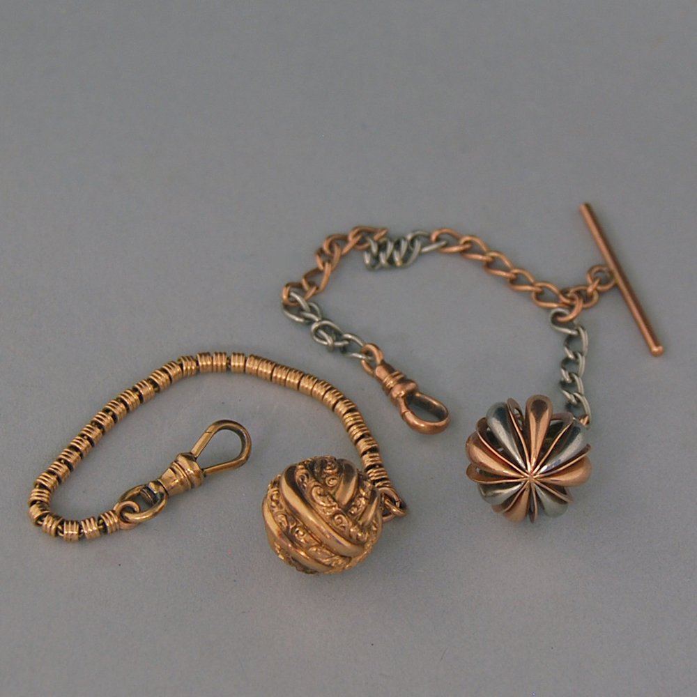 Appraisal: Two Antique kt Gold Spherical Fobs one rose gold the