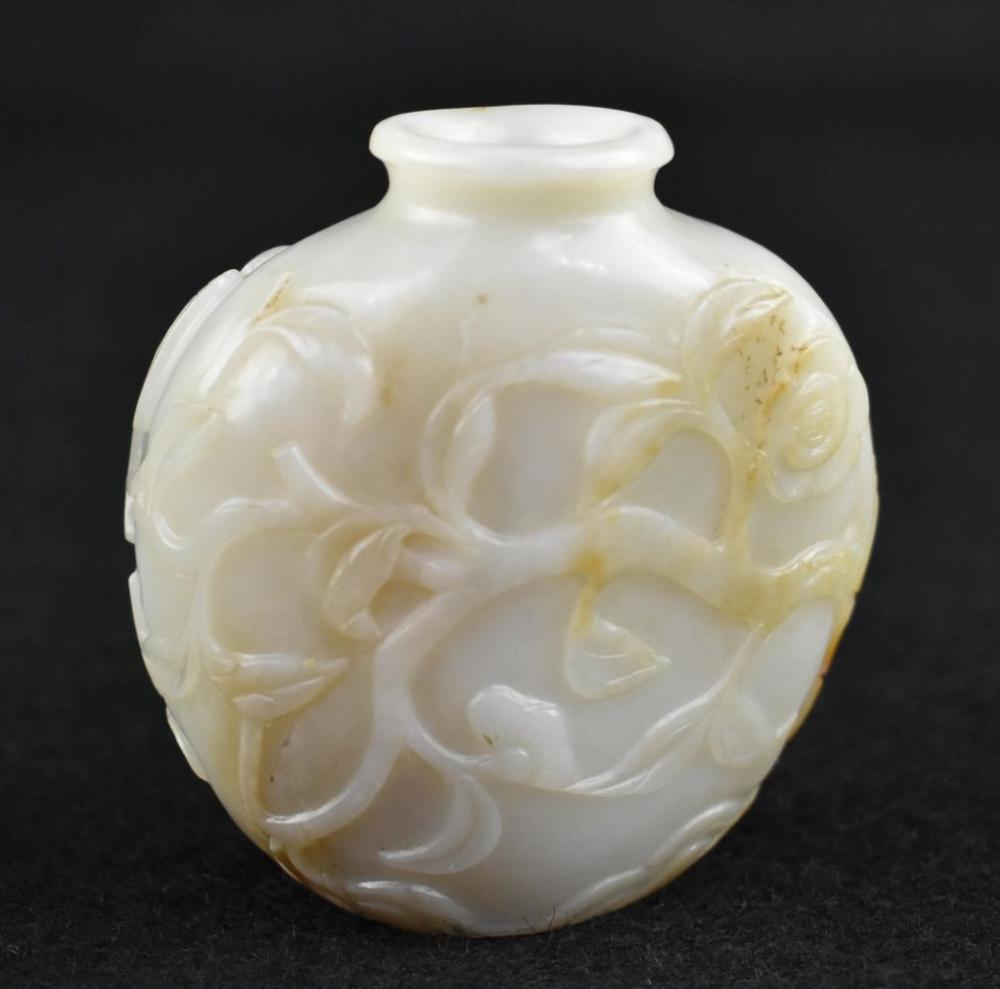 Appraisal: CHINESE WHITE JADE VASE MASTER SNUFF BOTTLEThe asymmetrically shaped vessel