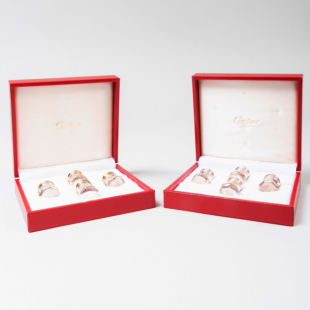 Appraisal: Two Sets of Four Cartier Silver Casters Marked 'Sterling' one