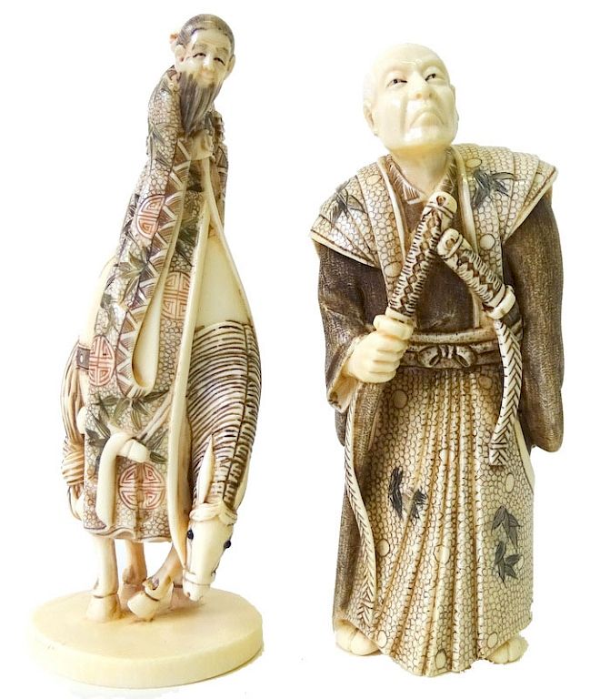 Appraisal: Two Chinese Figures Two Chinese Carved Ivory Netsuke Erotica Figure