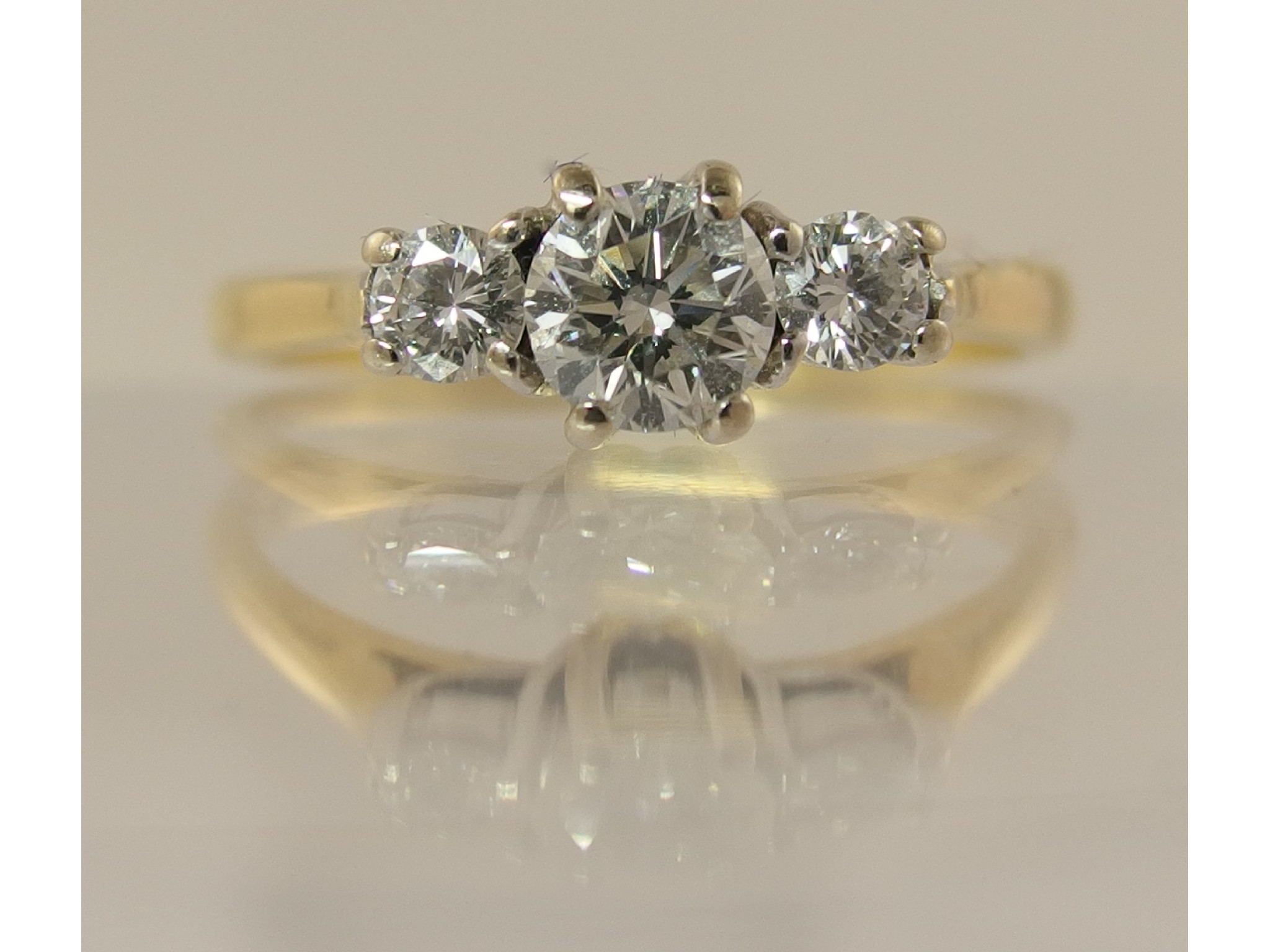 Appraisal: An ct gold three stone diamond ring of approx cts