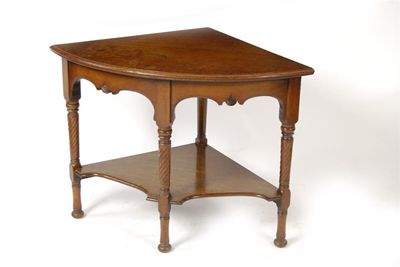 Appraisal: An Arts and Crafts oak corner table in the manner