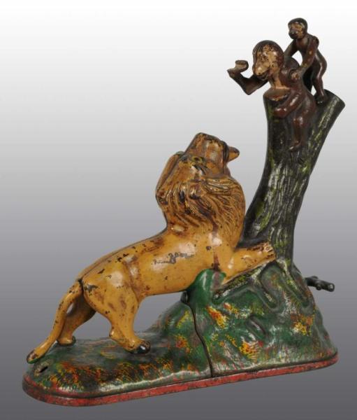 Appraisal: Cast Iron Lion Monkeys Mechanical Bank Description Manufactured by Kyser