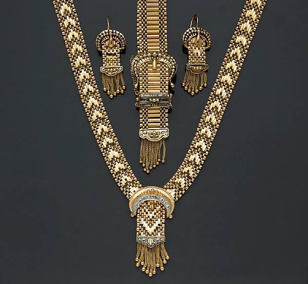 Appraisal: A suite of fourteen karat gold jewelry comprising a necklace