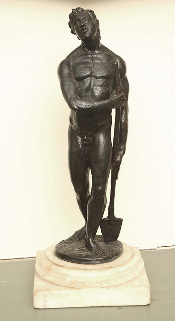 Appraisal: A TH CENTURY MODEL of a male nude figure holding