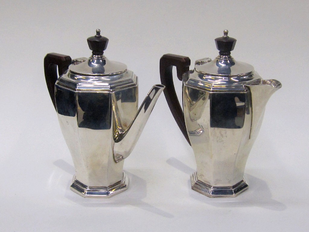 Appraisal: Silver coffee pot and matching hot milk jug Birmingham