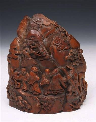 Appraisal: AN ANTIQUE CHINESE CARVED WOOD 'BOULDER' decorated immortals processing around