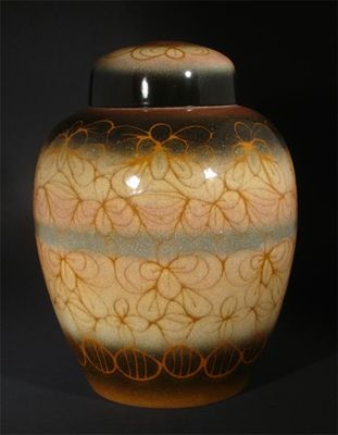 Appraisal: A Poole Pottery Contrast ginger jar and cover decorated with