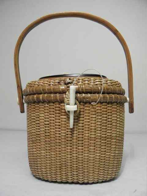 Appraisal: Farnum Nantucket basket Signed on base ''Farnum '' Decorated with