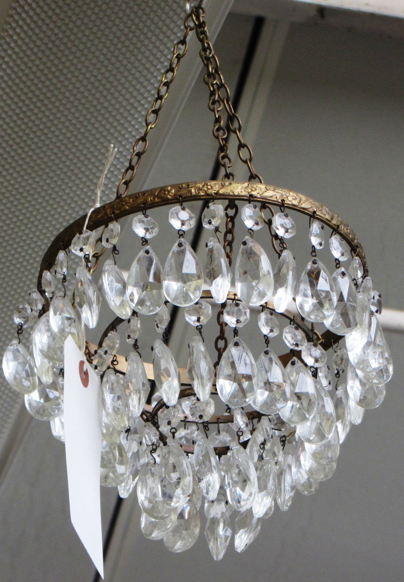 Appraisal: Three gilt metal bag chandeliers hung with cut glass drops