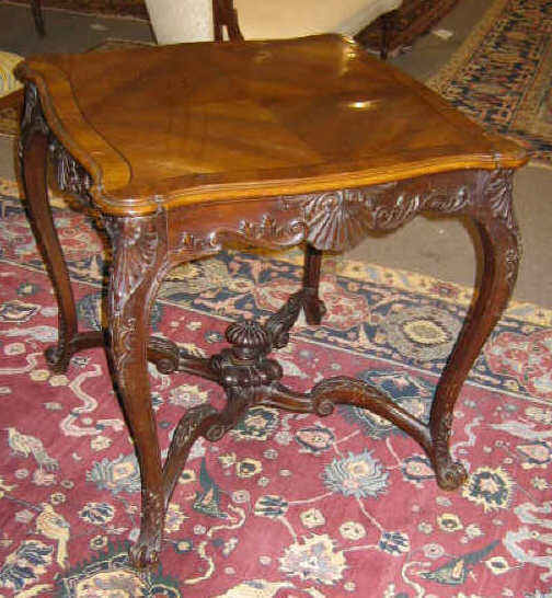 Appraisal: FRENCH LOUIS XV STYLE CARVED CENTER TABLE Having a shaped