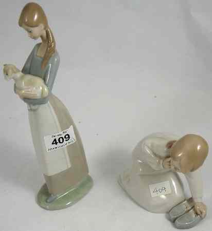 Appraisal: Lladro figure of a Girl holding a Lamb height cm