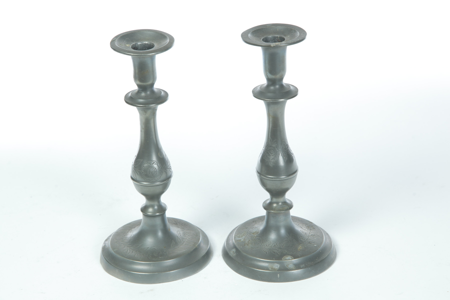 Appraisal: TWO ENGRAVED FLAGG AND HOMAN CINCINNATI OHIO PEWTER CANDLESTICKS Mid