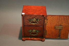 Appraisal: An Edwardian oak jewellery safe