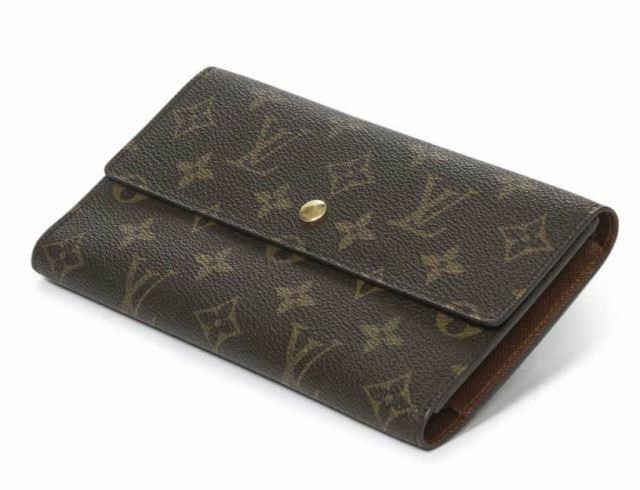 Appraisal: Louis Vuitton Porte Tresor International wallet in monogram coated canvas