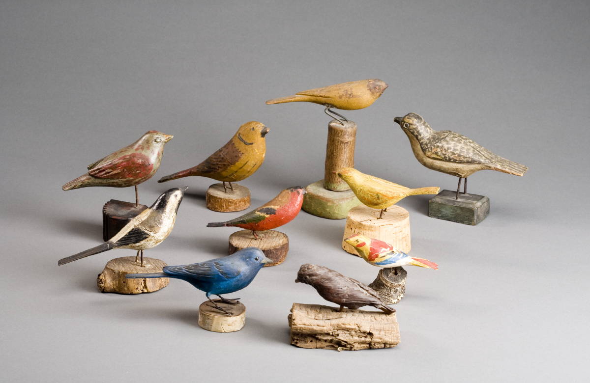 Appraisal: TEN CARVED AND PAINTED SONGBIRDS CIRCA Length of largest inches