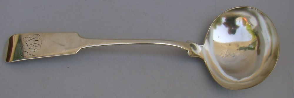 Appraisal: AMERICAN SILVER SOUP LADLE th CenturyWith tipt-back fiddle handle Marked