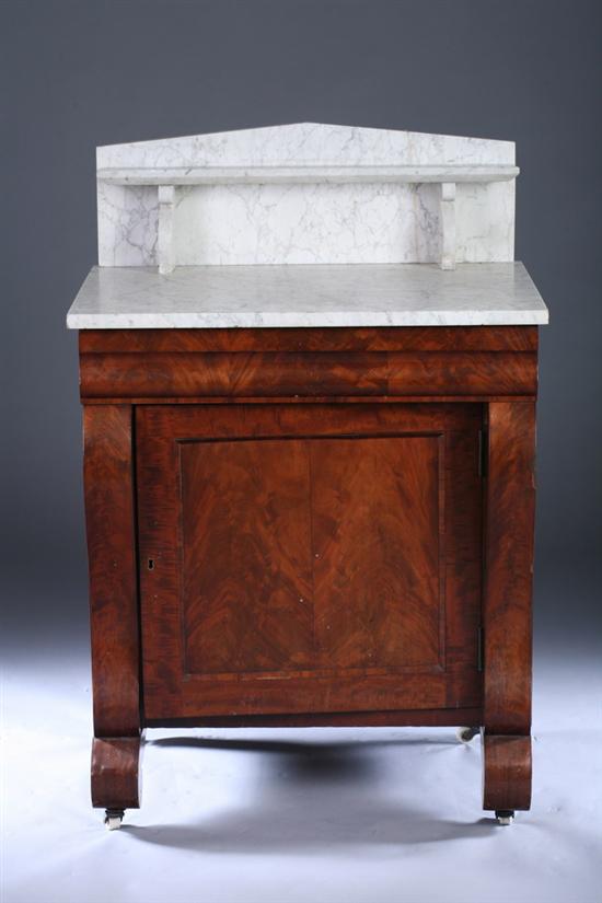 Appraisal: AMERICAN EMPIRE MAHOGANY MARBLE-TOP WASH STAND th century Slab-top with