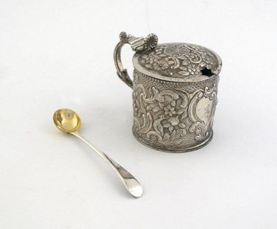 Appraisal: A George III IV embossed mustard pot profusely decorated with