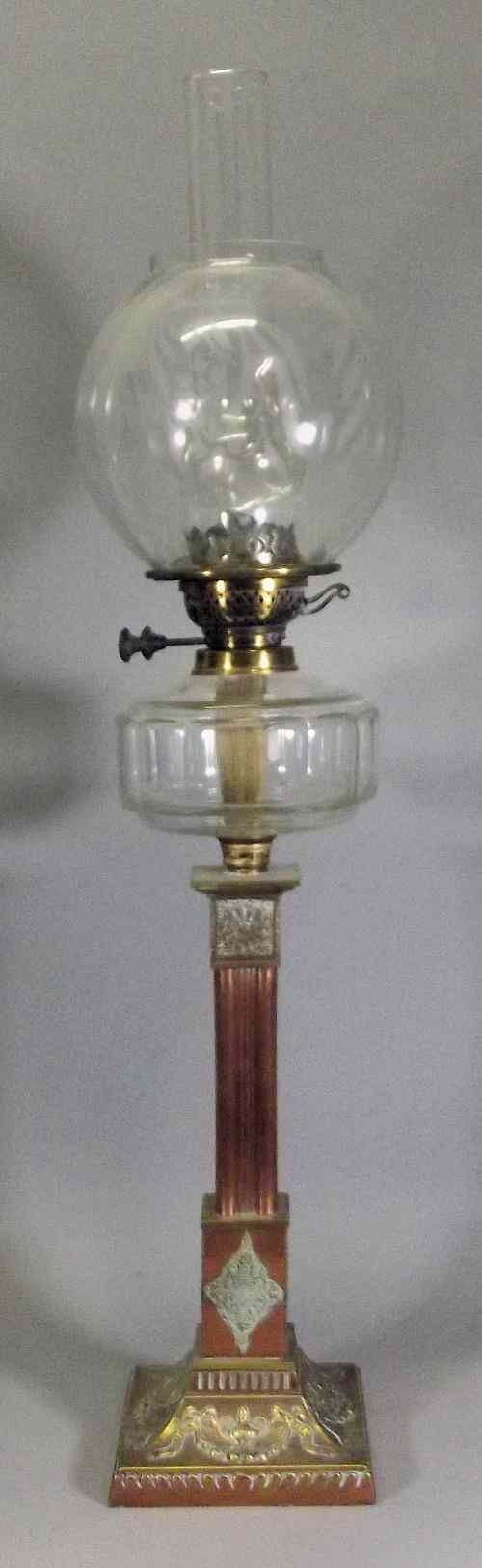 Appraisal: A late Victorian copper and brass table oil lamp with