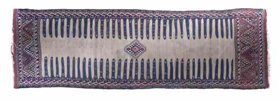 Appraisal: A Soumak Wool Runner having a central diamond medallion on