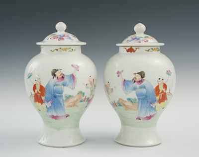 Appraisal: A Pair of Famille Rose Eggshell Vases with Lids Chinese