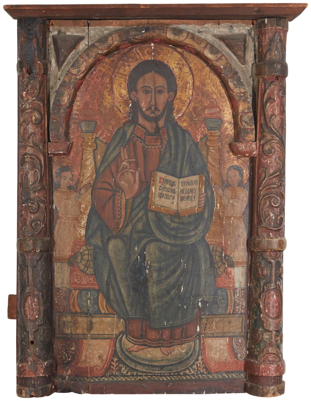 Appraisal: A carved and polychromed wood Russian or Greek icon th