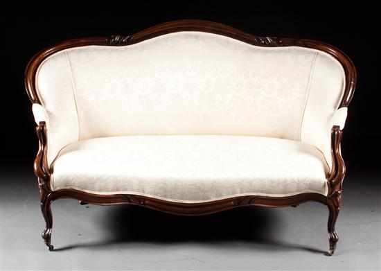 Appraisal: American Rococo Revival walnut settee mid- th century in H