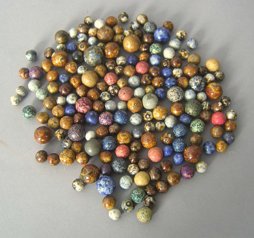 Appraisal: Group of clay Bennington glass and earthenware marbles Provenance Collection