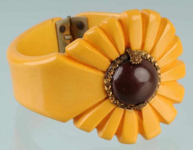 Appraisal: Bakelite Clamp Bracelet with Inset Center Description CORRECTION Flower is