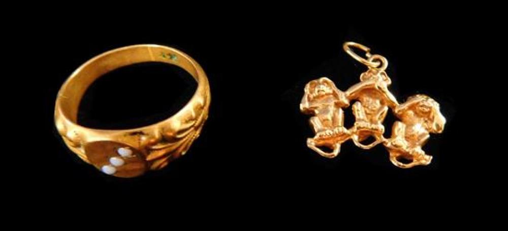 Appraisal: JEWELRY K yellow gold ring and monkey charm both marked